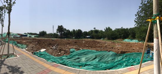 【啄木鸟在行动】张马屯街万科新里程小区以北 存在裸土未覆盖