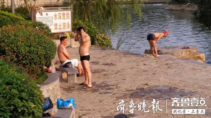 濟南歷陽湖內也有野泳者，無視“禁止游泳”標識下水