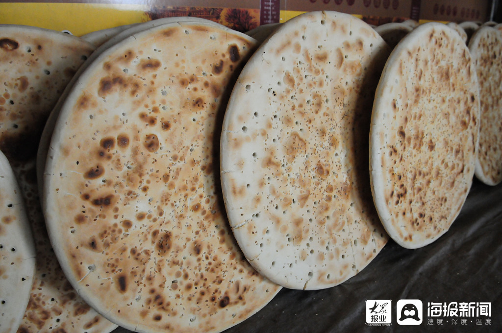 山东聊城：“非遗”美食成俏销年货