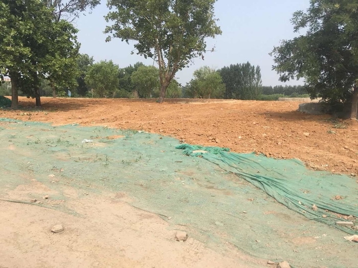 【啄木鸟在行动】济南华腾精密机械有限公司北侧渣土裸露 存扬尘隐患