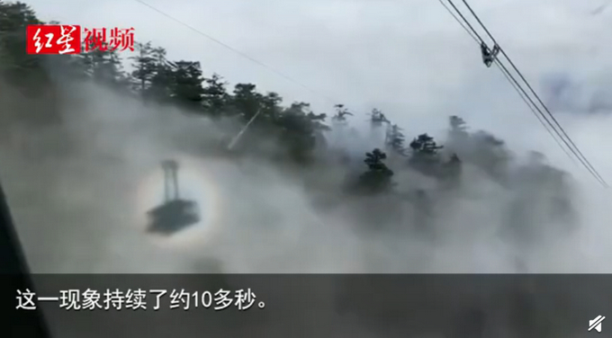 峨眉山金顶缆车被奇光笼罩，网友脑洞大开 物理老师：系日晕现象
