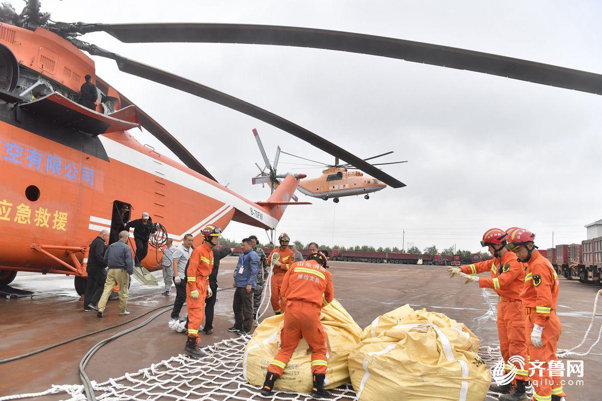 寿光抗洪M-26直升机运送砂石200吨 直升机投石封堵决口国内尚属首次