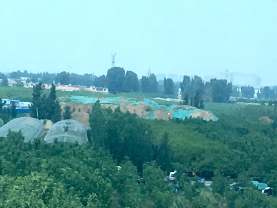 【啄木鸟在行动】长清区赵营地铁站北侧渣土覆盖不全