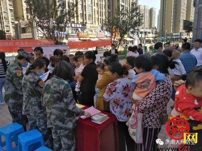 警钟长鸣 勿忘国耻 纪念“九·一八”事变89周年暨人防法规宣传教育进社区活动举行