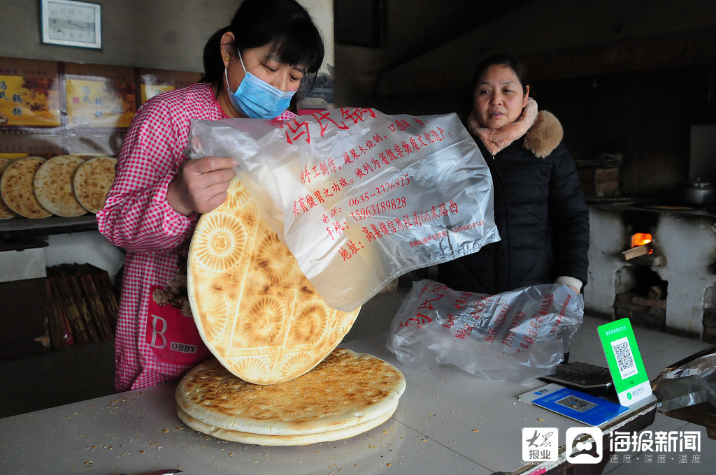 山东聊城：“非遗”美食成俏销年货