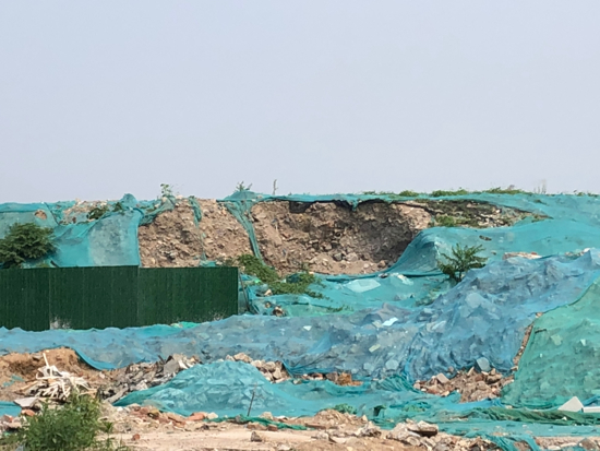 【啄木鸟在行动】水屯路与水屯北路交汇处东北角存在扬尘隐患