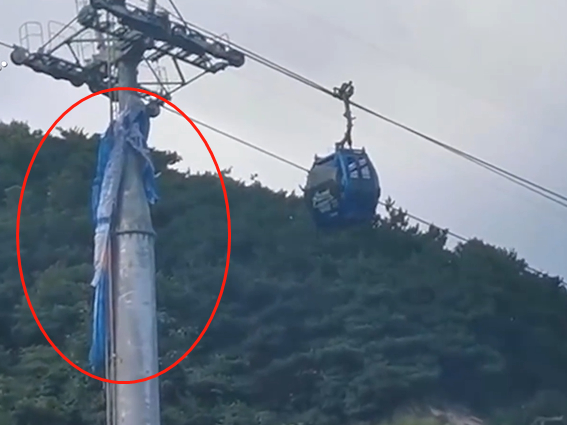 一景区滑翔伞与缆车相撞致人坠落游客拍下惊险瞬间